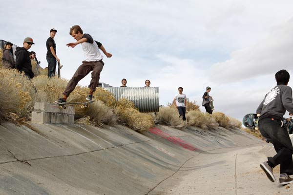 Mitch Haight locks into a tailslide before 360 shuv'n out..